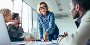 Businesswoman leading business presentation