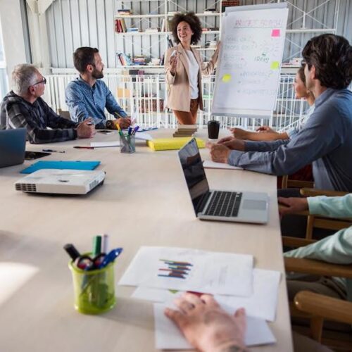 group of colleagues engaged in an in-house agile training session