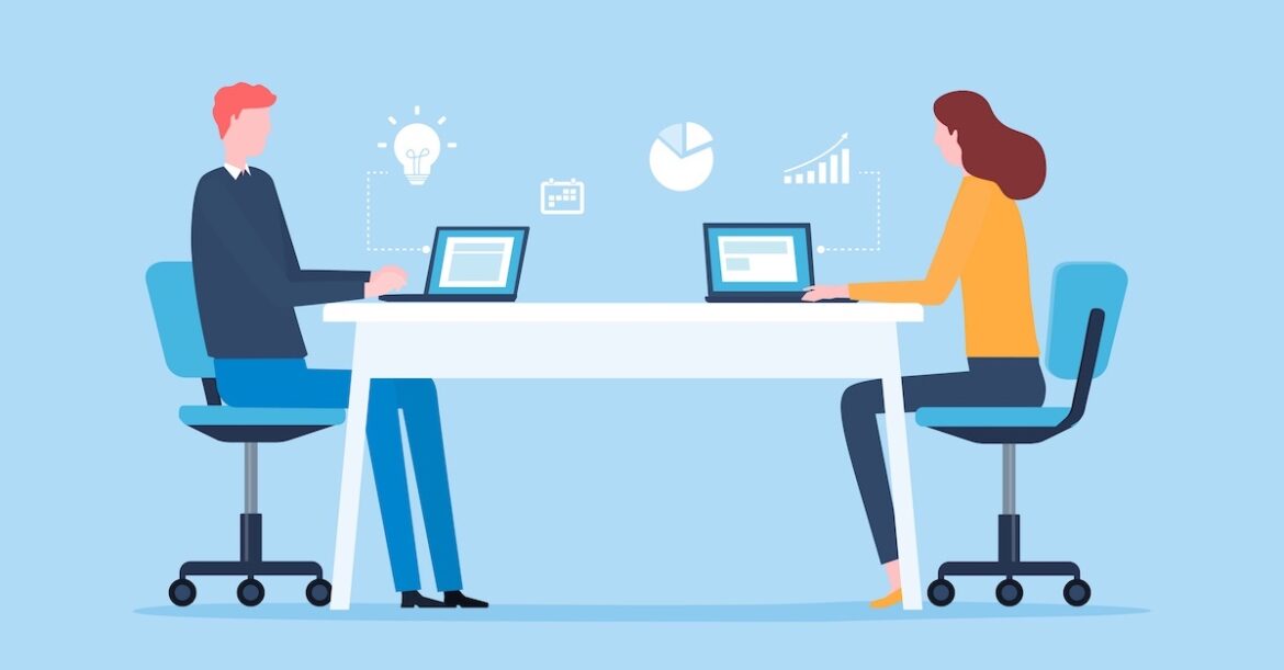 Graphic showing two people sitting opposite one another at share desk